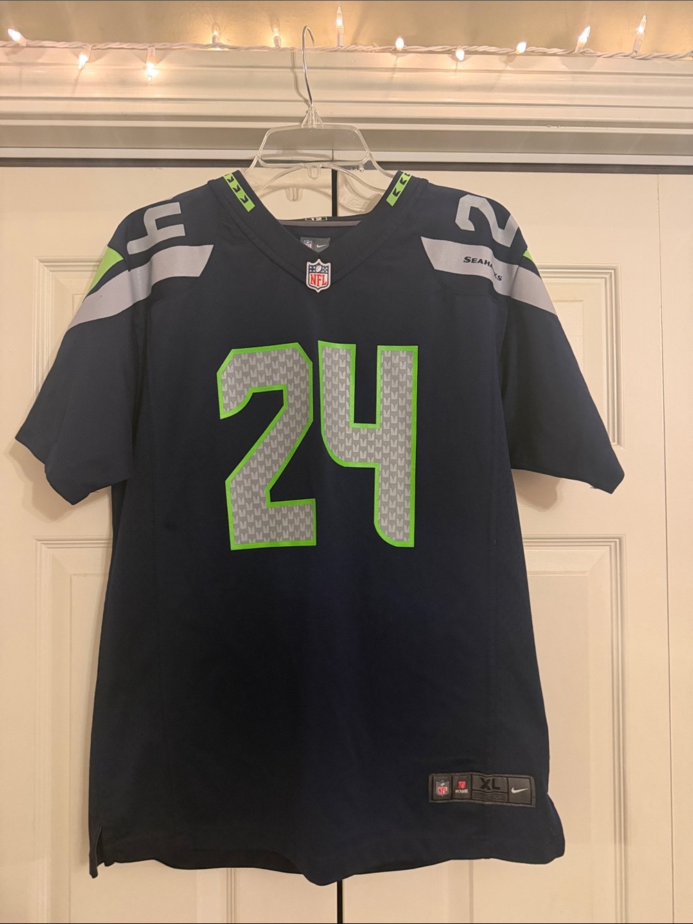 Nike Men's Navy Football Jersey with Lime Green Accents #24 Lynch